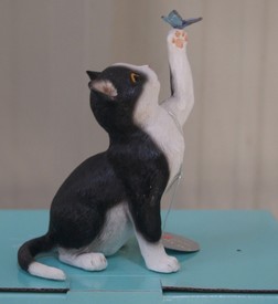 Black & White Cat Playing with Butterfly Statue by Leonardo